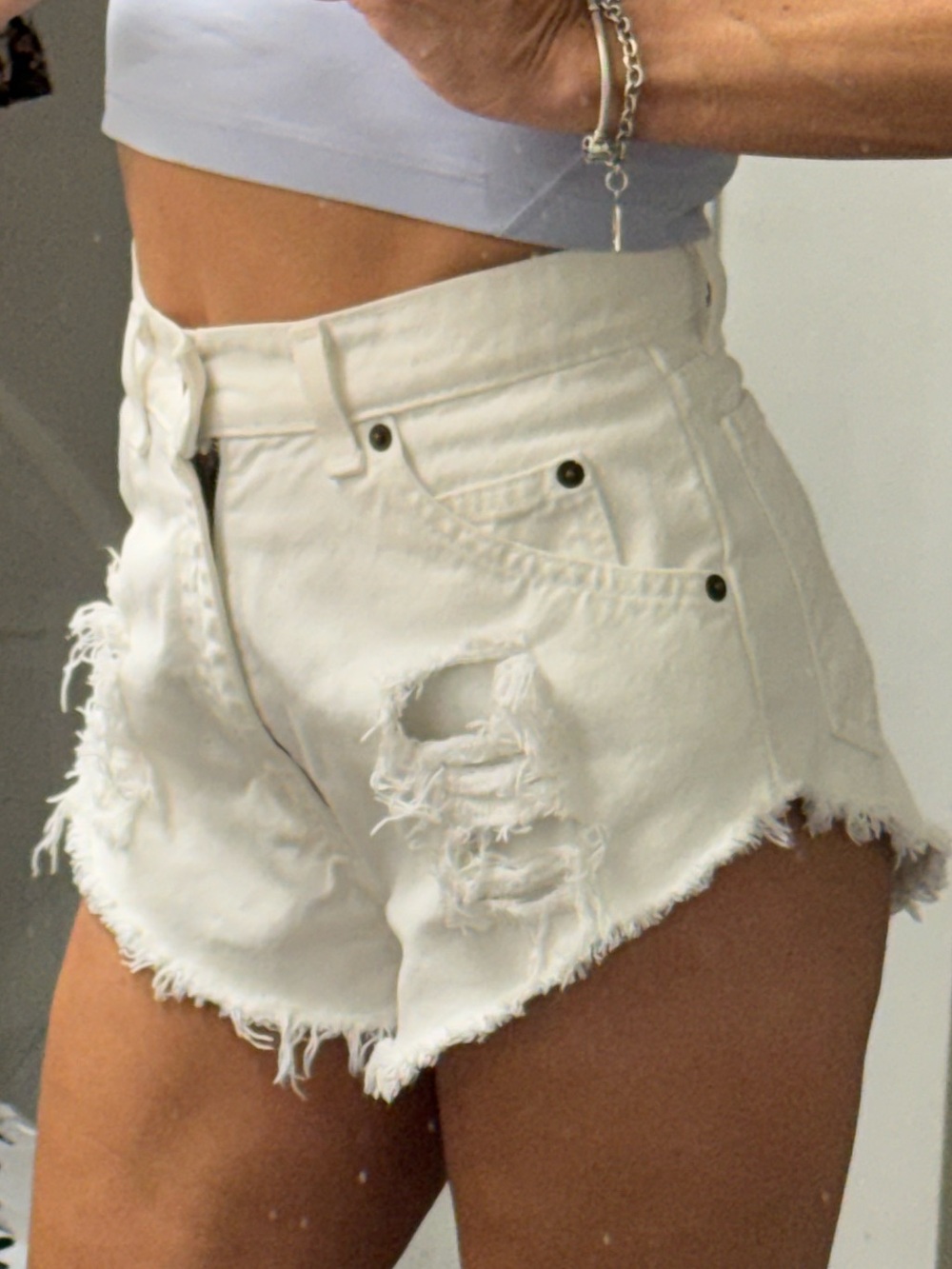 Levy’s High-Rise Distressed White Denim Shorts